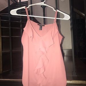 mauve tank with ruffle in the center